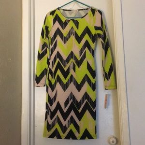 Above the knee bright bodycon dress.